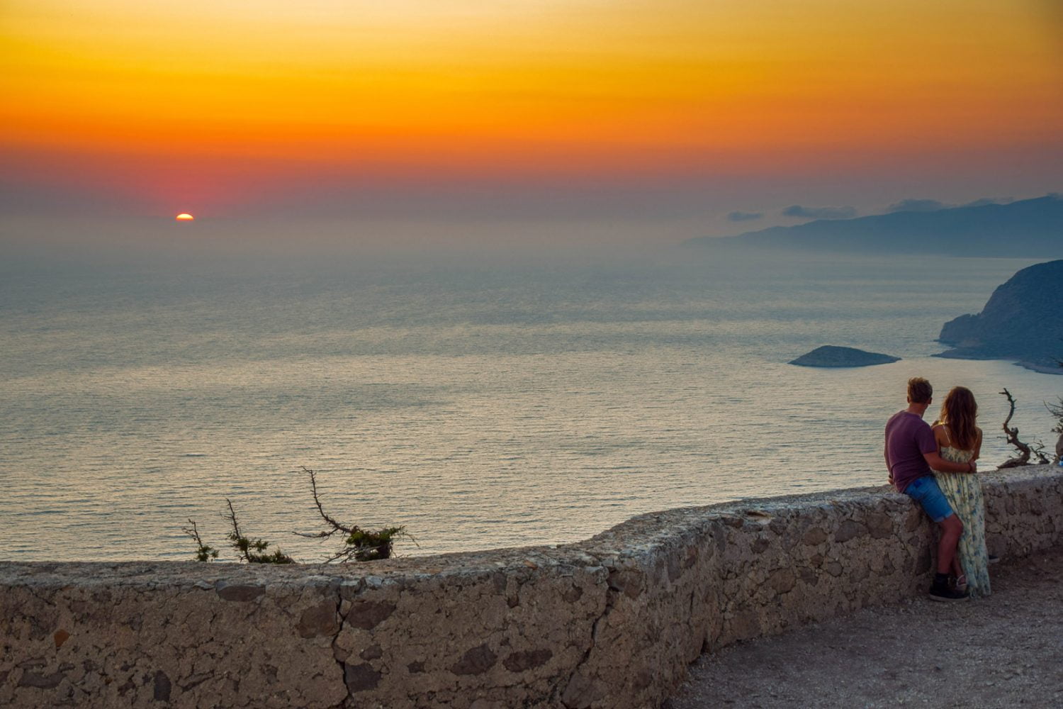 romantic sunset in Monolithos after wine tasting in Ebonas