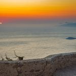 romantic sunset in Monolithos after wine tasting in Ebonas