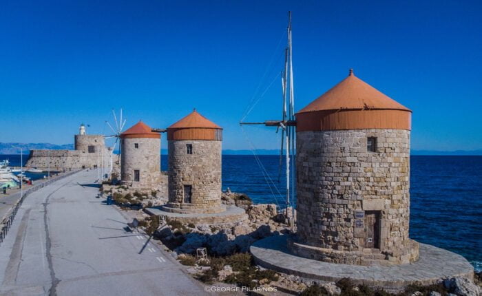 the three windmills of mandraki harbor or Rhodes