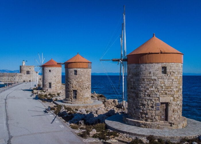 the three windmills of mandraki harbor or Rhodes