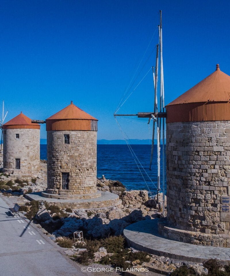 the three windmills of mandraki harbor or Rhodes